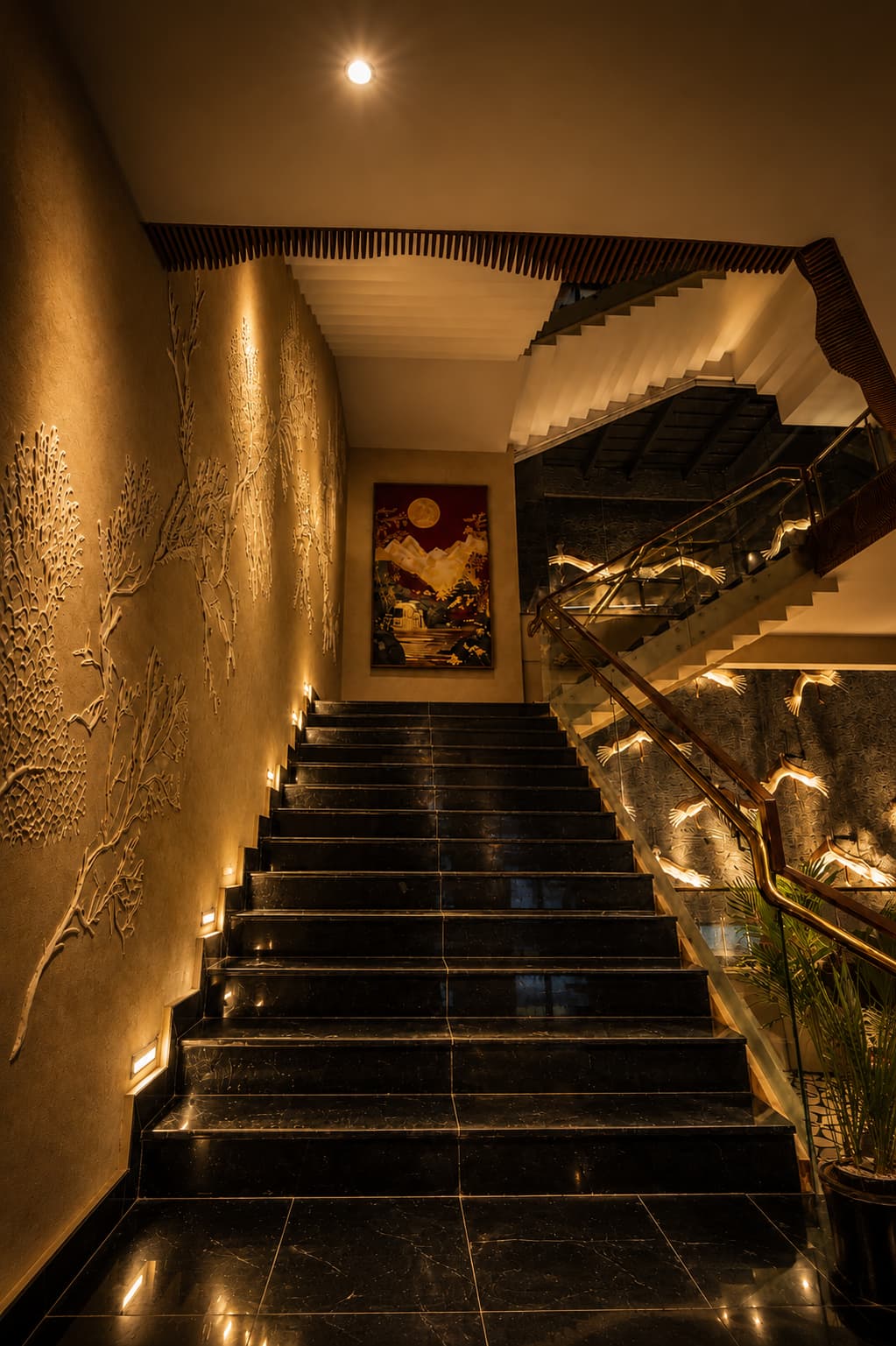 The landscape mural beside the staircase
